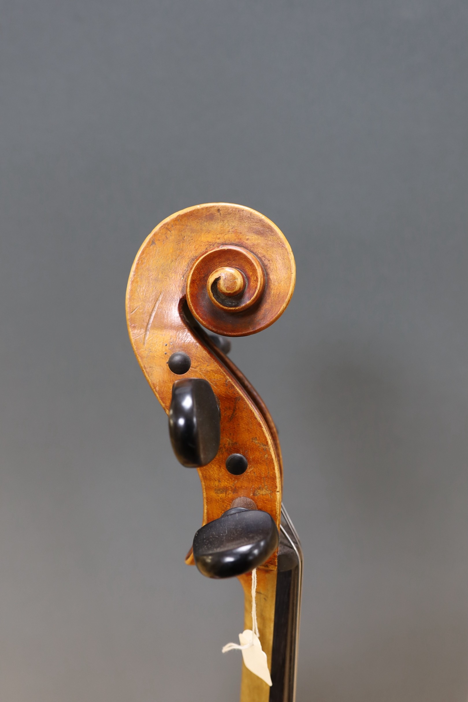 An early 20th century French half size cello, with soft case and bow